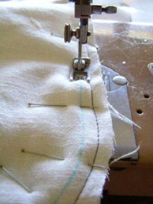 8.  Sew along the line drawn on the scrap fabric