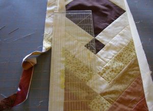 Optional: Trim away excess strip fabric.