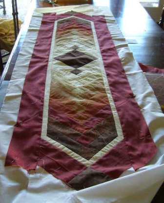 12.  Outer borders sewn and table runner piecing complete!