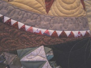 Red triangles are 1/2" inch and include some of Grandma's fabrics