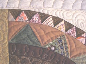 Detail of light colored fabric in outer arch