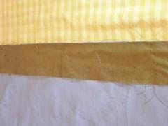 Second stripe fabric placed on top of first stripe and Foundation Fabric.