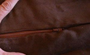 Zipper sewn to both pillow back rectangles.