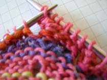 Lift Stitch 2 and pass over Stitch 1.