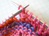 Lift Stitch 3 and pass it over Stitch 1.