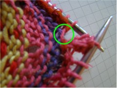 This Stitch will be picked up and knit with "popcorn stitch" on next row to close hole.