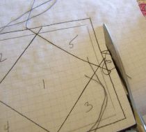 Cutting away excess fabric.