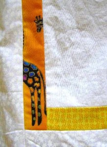 Corner detail. Two whites and a giraffe!