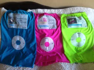 Ipod costumes in blue, pink and lime green.