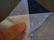 Lift top square edge to verify seams align.