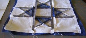 Ohio Star Block and plain block poked and pinned.