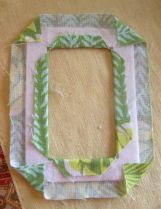 Photo 5.  Fusing fabric to frame.