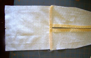 Lining Ends to Lining Tops - with 3/8" space between folded edges of lining Tops.