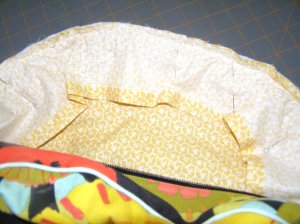 Side curved edge seams sewn