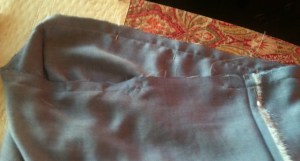 11. Upper edge stitched leaving 5" space unsewn.