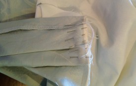 Pin Pleated section to curved edge of sheet and stitch.