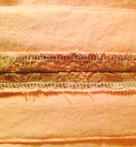 Pleats - center seam and "topstitching" of inner folds.