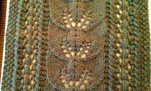 This is the closest to the actual yarn color - an heathered dark green.